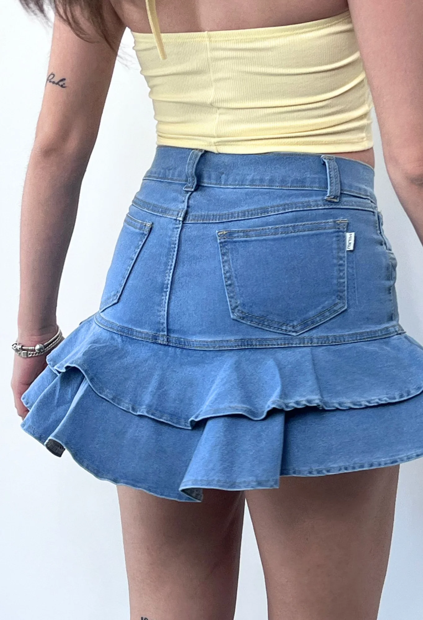 MIL545 - SHORT POLLERA VOLADO ELASTIZADO — vista 4